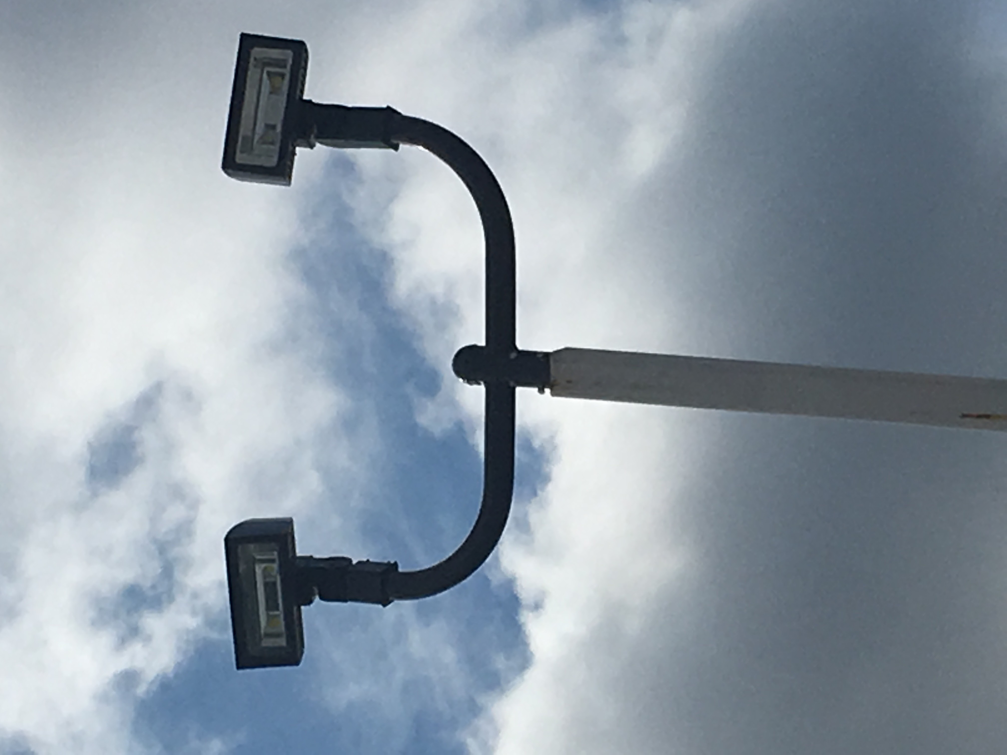 LED area light fixture installed on a commercial pole