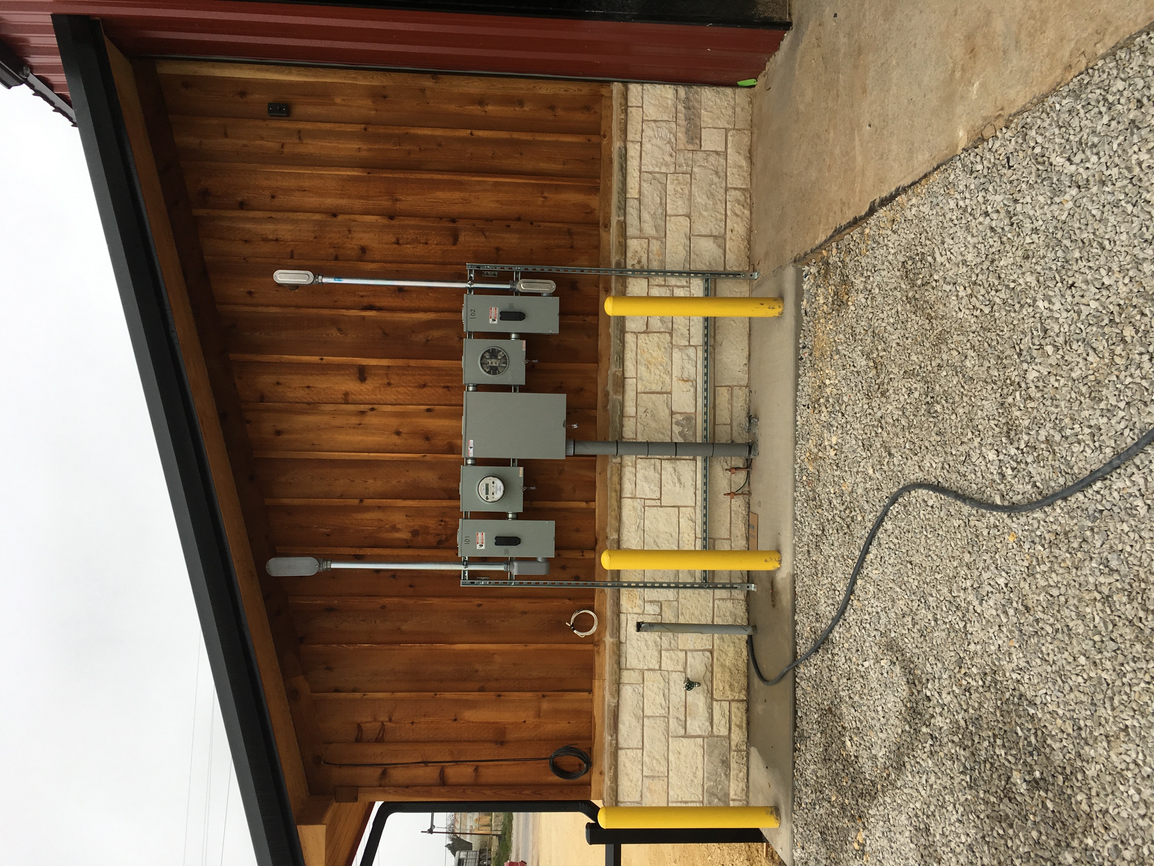 New electrical meter and panel installation on the exterior of a building near Stephenville, TX.