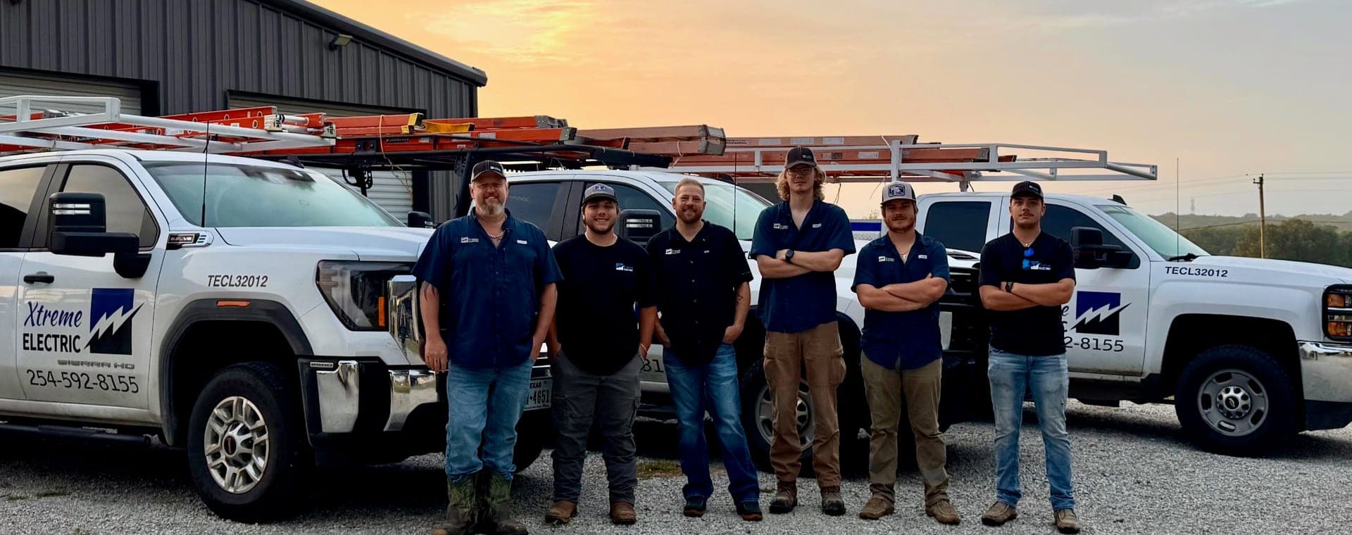 The Xtreme Electric team standing in front of their service trucks in Stephenville, TX, licensed electrician TECL32012