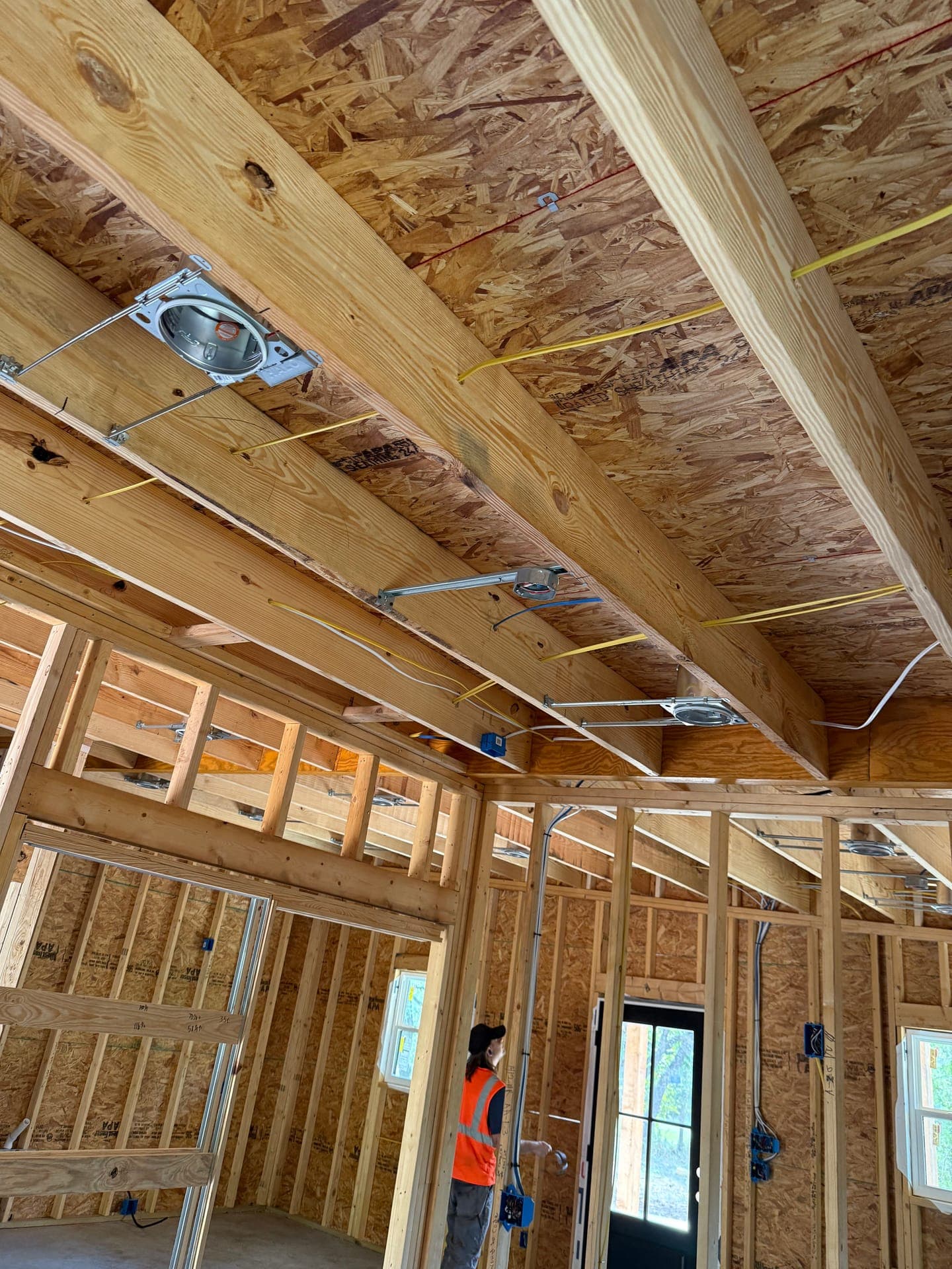Recessed lighting cans installed in ceiling framing during a Stephenville, TX construction project by Xtreme Electric.